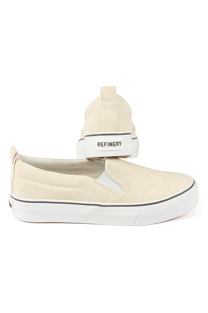 Cream slip store on sneakers